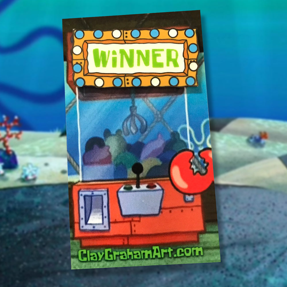 Skill Crane Winner 1.75" GITD hard enamel pin