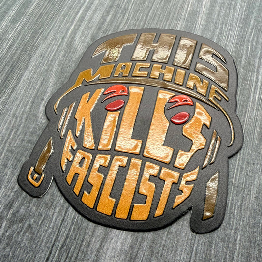 This Machine Kills Fascists embossed vinyl sticker
